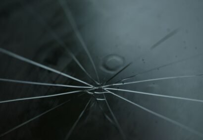 Cracked windshield on a car in Cincinnati, OH that may need repair or replacement